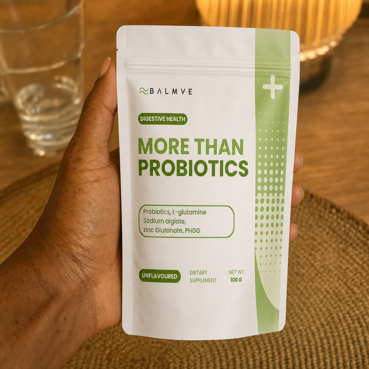 BALMVE More Than Probiotics contextual product image - bloom-probiotics-context-9-hand.png